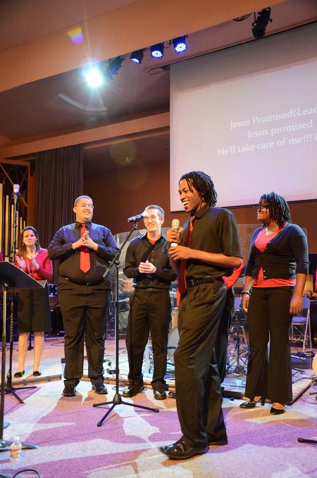 Derique Cannon (front), junior electrical engineering major, leads MOSAIC choir during chapel. - Photo by Zac Calvert