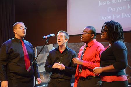 MOSAIC choir members Cedric Townsend, Zac McMillan, David Madden, and Treasure Hightower lead music during chapel. - Photo by Zac Calvert