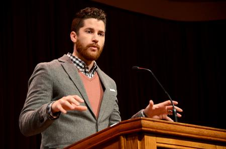 Lee Wilson, director of discipleship, introduces Scott Huelin to speak in chapel. - Photo by Ebbie Davis