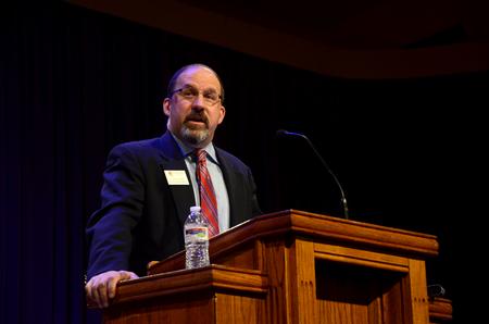 Scott Huelin, director of the honors community and associate professor of English, discusses the importance of keeping the right mind-set as Christians in a culture where materialistic Christmas activities overtake the real meaning behind Christmas. - Photo by Ebbie Davis