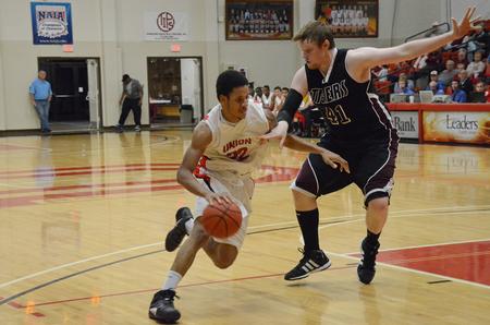 Leventrice Gray dribbles around a Cambellsville player during a game. - Photo by Anne Richoux