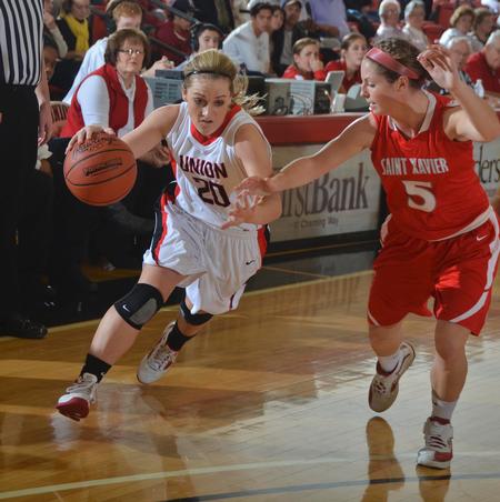 Union Lady Bulldog Amy Philamlee drives in  strong to the hoop. - Photo by Morris Abernathy