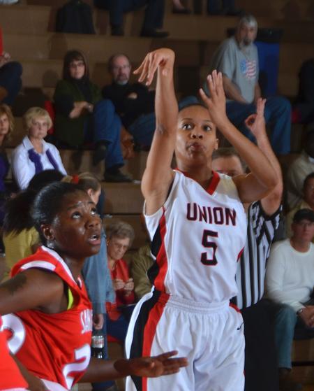 Union's LaTesa McLaughlin knows the importance of follow through. - Photo by Morris Abernathy