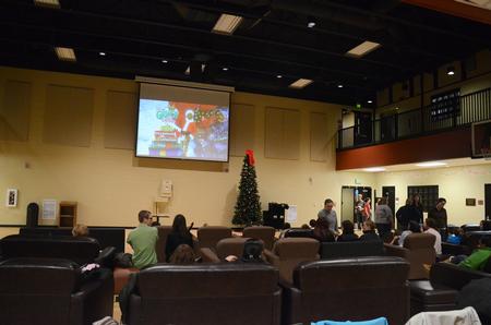Students sit in the Bowld Student Commons to watch How the Grinch Stole Christmas for SAC's Movie in the Bowld. - Photo by Zac Calvert