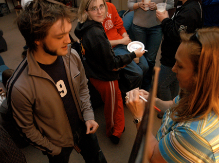 Sophomore Daniel Hall puts in his order for Higher Grounds coffee at Mochafee 2004. - Photo by Kristen Nicole Sayres