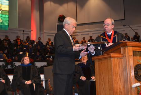 For his friendship to Union University, Lloyd Hansen received the Robert E. Craig Service Award at Union’s graduation ceremony Dec. 10 at West Jackson Baptist Church.  The award is named after Union’s 13th president, who led the university for more than two decades and was responsible for reestablishing Union with the churches of the Tennessee Baptist Convention. Craig was also responsible for relocating the university campus to north Jackson.
 - Photo by Morris Abernathy