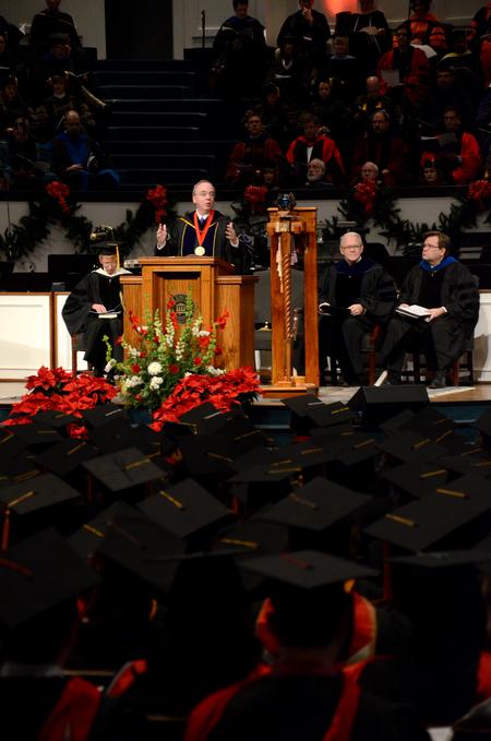 David S. Dockery, president of the university, greets graduates and their families and friends during 2011 Fall Commencement Services held at West Jackson Baptist Church.  - Photo by Jacob Moore