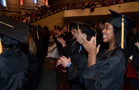 Graduates applaud during the 2011 Fall Commencement Services held at West Jackson Baptist Church. - Photo by Jacob Moore