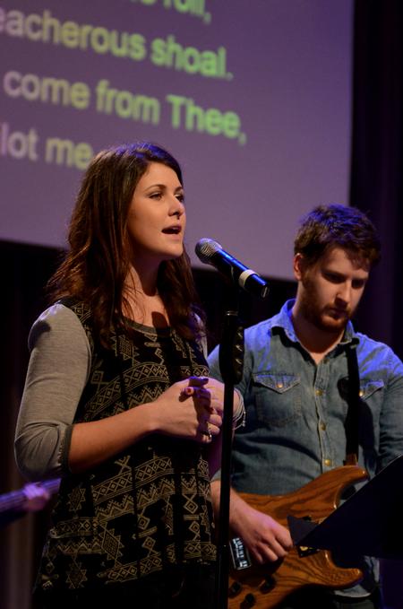 Bethany Gaines, freshman elementary education major, helps lead music in chapel prior to a message from Tony Merida, pastor of Imago Dei Church in Raleigh, N.C.  - Photo by Anne Richoux