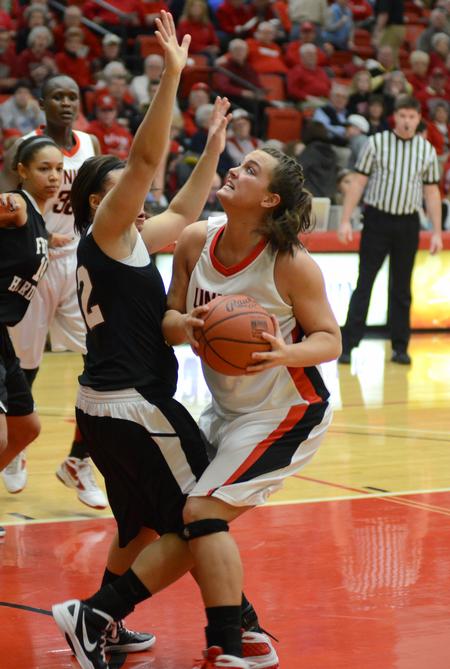 Photo by Jacob Moore
Lady Bulldog Shelby Ashcraft looks for a shot while being blocked by Freed Hardeman's Hayley Newby during a game Feb. 11 at the Fred DeLay Gymnasium. - Photo by Jacob Moore