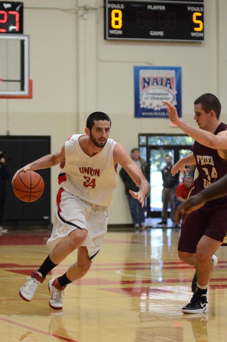 Photo by Jacob Moore
Bulldog Dani Marti drives down the court during a game Feb. 11 against Freed Hardeman at the Fred DeLay Gymnasium. - Photo by Jacob Moore