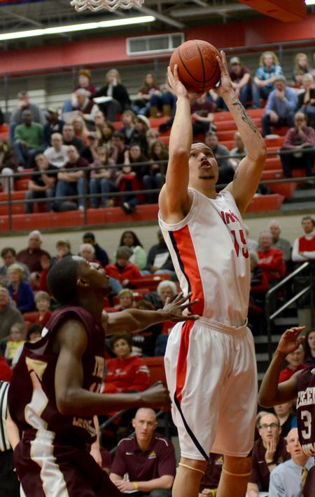 Photo by Jacob Moore
Bulldog Anthony Freeman Jr. goes up for a shot during a game Feb. 11 against Freed Hardeman at the Fred DeLay Gymnasium. - Photo by Jacob Moore