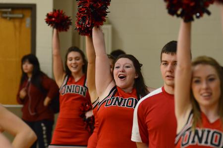 Photo by Jacob Moore
Cheerleader Kayla Smith celebrates a goal during a basketball game against Cumberland University Feb. 13 at the Fred DeLay Gymnasium. - Photo by Jacob Moore