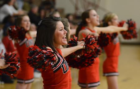 Photo by Jacob Moore
Cheerleader Megan Mysinger entertains the crowd during a basketball game against Cumberland University Feb. 13 at the Fred DeLay Gymnasium. - Photo by Jacob Moore