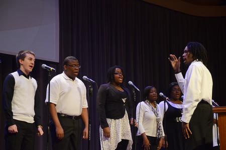 Derique Cannon, junior electrical engineering major, leads the MOSAIC choir as they perform in chapel. - Photo by Zac Calvert