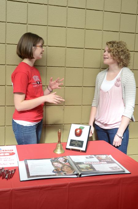 Emily Grove, sophomore special education major, and Rachel Emanuel, sophomore TESL/Spanish major, talk at the Student Tennessee Education Association table during the student organization fair.  - Photo by Anne Richoux