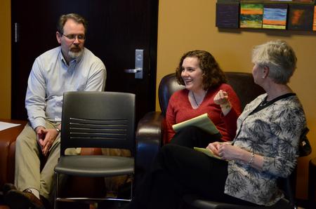John Netland, Janna Chance, and Pam Sutton give advice to members of Sigma Tau Delta who will be presenting work at the society's national convention in New Orleans. - Photo by Jacob Moore