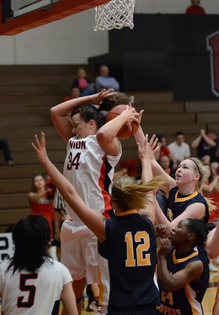 Shelby Ashcraft attempts to rebound during a game against Blue Mountain College in the opening round of the TranSouth Athletic Conference Championship. - Photo by Jacob Moore