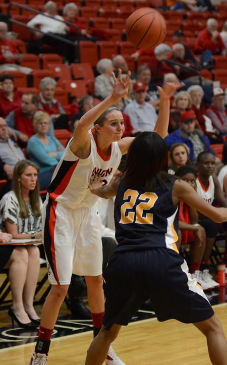 Paige Parker passes the ball to a teammate during a game against Blue Mountain College played in the Fred DeLay Gymnasium. - Photo by Jacob Moore