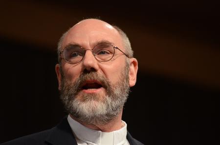 Peter Leithart, senior fellow of theology at New Saint Andrews College, speaks to Union students and employees about the importance the Lord's Supper and how we are to share with others. - Photo by Zac Calvert