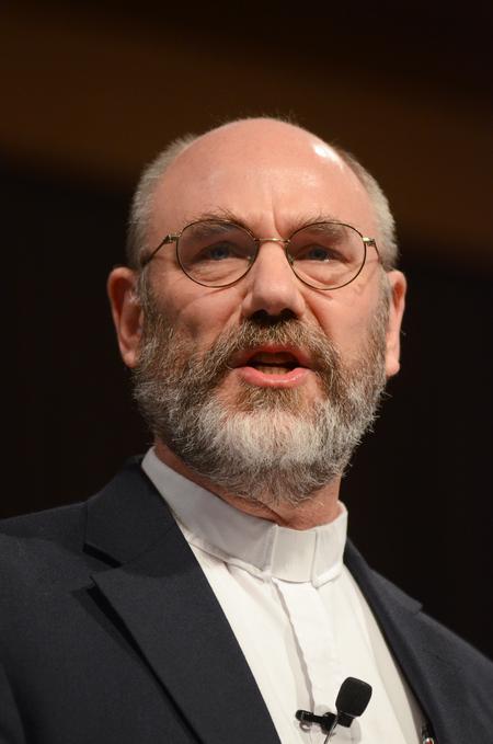 Peter Leithart, senior fellow of theology at New Saint Andrews College, speaks to Union students and employees about how the Lord's supper is not just about the food but about sharing and being at peace with others. - Photo by Zac Calvert