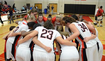 Photo by Jacob Moore

The Lady Bulldogs huddle after winning the TranSouth tournament championship game against their rival Freed Hardeman Lady Lions. - Photo by Jacob Moore