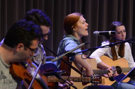 Alice Hardin sings with other Christ Community Church members at the beginning of chapel. - Photo by Jacob Moore
