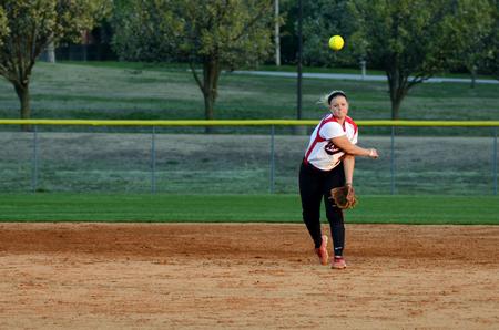 Sam Giesler throws the ball to another player during  a double-header against Freed-Hardeman University. The Lady Bulldogs won both games 2-0.  - Photo by Anne Richoux