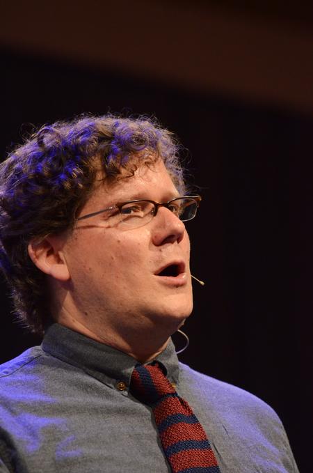 David Dark, author of "The Sacredness of Questioning Everything," speaks to the chapel audience about Martin Luther King Jr. and his idea of creative extremism, where one can make change with nonviolence just like Christ did. - Photo by Zac Calvert
