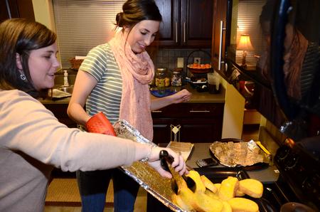 Ashley Jackson, resident director, opens her home up to students for a home-cooked meal during Be Our Guest. - Photo by Ebbie Davis