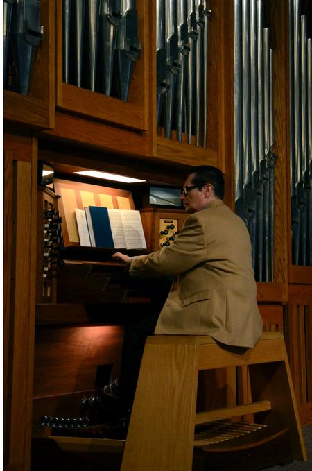 Ronald Boud, professor of music and university organist, plays the organ in chapel prior to a lecture from Frederica Mathewes-Green for the Crabtree Family Life Series. - Photo by Anne Richoux