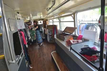 The bus was shipped over on a boat from England! Then the  bus was painted back to its original red color and completely remodeled into a thrift store.     This spring, the bus is launching a tour of 25 college campuses. Caleb Chapman's band, CALEB, will be performing each night on the college campus to drive more support to the bus. - Photo by Morris Abernathy