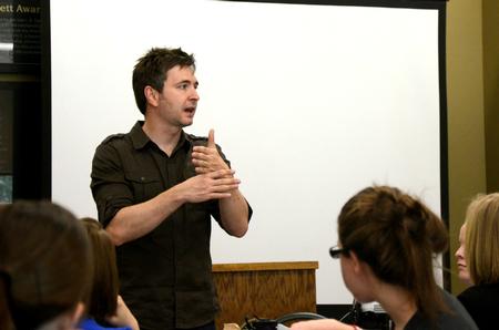 Travis Cottrell, worship pastor at Englewood Baptist Church, speaks at a CCMS event.  - Photo by Anne Richoux