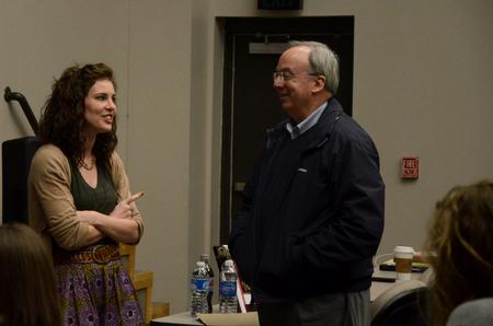 Kylie McDonald, junior political science major, talks with David S. Dockery, president of the university, prior to a Student Senate meeting. - Photo by Anne Richoux
