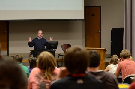 David S. Dockery, president of the university, talks to students about upcoming plans for the university during a Student Senate meeting. - Photo by Anne Richoux