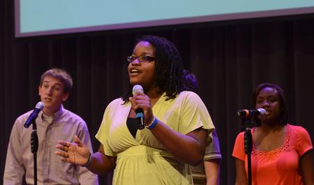 Treasure Hightower, senior digital media studies major, sings with the MOSAIC choir during chapel. Also pictured is Zac McMillian, sophomore intercultural studies major, and Gabby Bonner, freshman biology major.
 - Photo by Jacob Moore