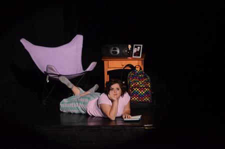 Ashley Payton, sophomore social work major, poses during her performance in the 15th Annual Variety Show with "The Hopeful Rascals." - Photo by Zac Calvert