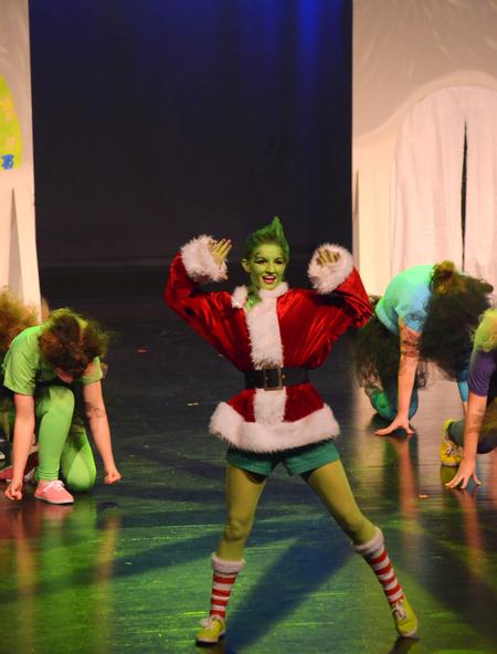 Erin Spencer, senior biology major, performs as the Grinch during the Kappa Delta act in the 15th Annual Variety Show. - Photo by Zac Calvert