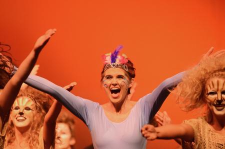 Hollie Garland, sophomore sports medicine major, plays the role of a bird during the Chi Omega's Lion King act at the 15th Annual Variety Show. - Photo by Zac Calvert