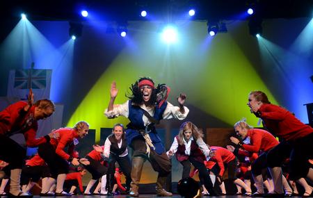 Claudia Velasco, as Captain Jack Sparrow from "Pirates of the Caribbean", performs a stomp along with her fellow sisters in Zeta Tau Alpha sisters at the 15th Annual Variety show. - Photo by Ebbie Davis