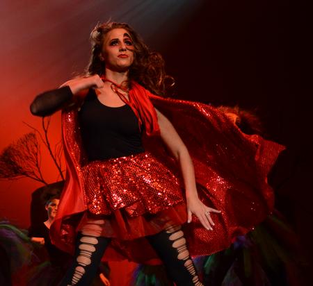 Tabitha Higgins, junior social work major, plays the part of Little Red Riding Hood in the "Once Upon A Time" large group performance. - Photo by Ebbie Davis