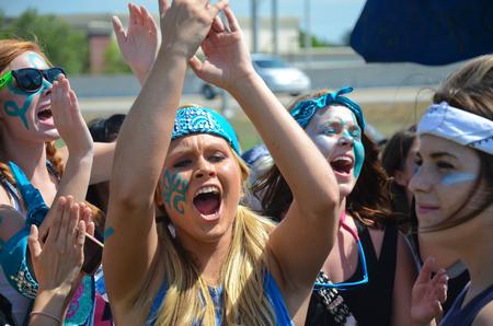 Morgan Smith, junior nursing major, cheers on her Zeta Tau Alpha sisters during Greek Olympics. - Photo by Zac Calvert