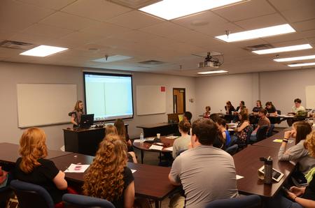Megan Bailey, senior intercultural studies major, presents her capstone on second-generation immigrants during the Ninth Annual Scholarship Symposium. - Photo by Zac Calvert