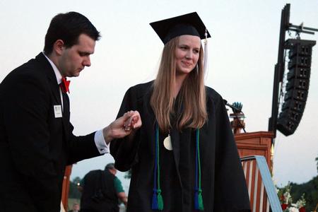 Katherine Pullen, intercultural studies and journalism graduate, smiles after receiving the Tigrett Medal at spring graduation. - Photo by Kristi McMurry Woody