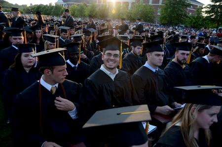 Rob Calvert, engineering graduate, smiles after receiving his diploma at spring graduation.  - Photo by Ebbie Davis