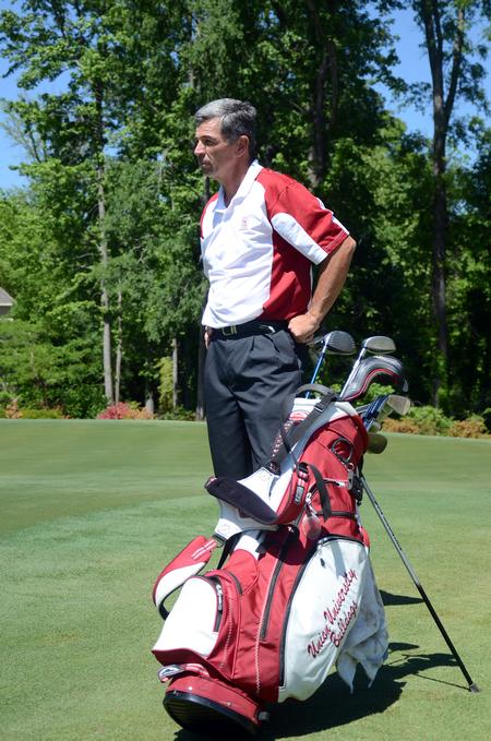 Andy Rushing, head golf coach, watches his players on the course.  - Photo by Zac Calvert