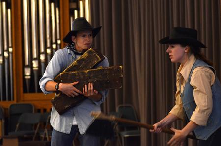 Students practice their performance of the Spring children's play <em>The Saga of Pecos Bill (or How Comboyin' Really Got Started)</em>. - Photo by Jacob Moore