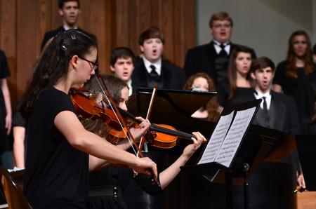 A string quartet performs alongside the vocal emsembles at the Spring Choral Concert.  - Photo by Ebbie Davis