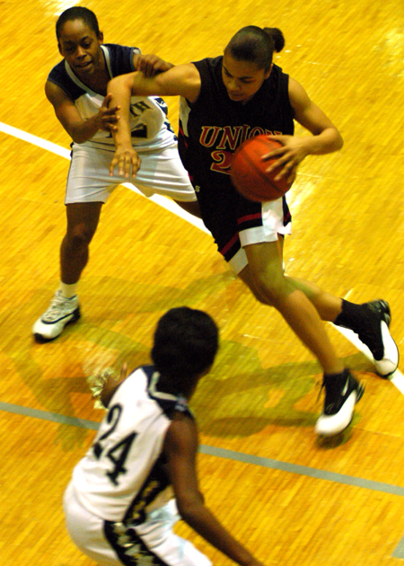 Christina Smith (23) drives to the hoop in Union's win at Lambuth. - Photo by Kristen Hiller