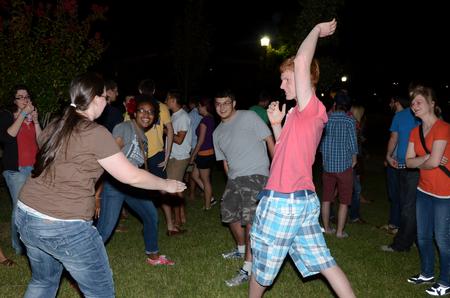Freshmen, Emily Pace, engineering major, Ashley Akerson, missions and art double major, Nick Rivera, pre-med biology major, and Ben Baytes, music major, play Ninja together during the Howdy Party.   - Photo by Anne Richoux